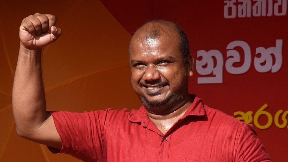 Nuwan Bopage, a presidential candidate from the People's Struggle Alliance, gestures as he arrives to attend an election campaign rally ahead of the presidential election, in Homagama, Sri Lanka, September 16, 2024. 