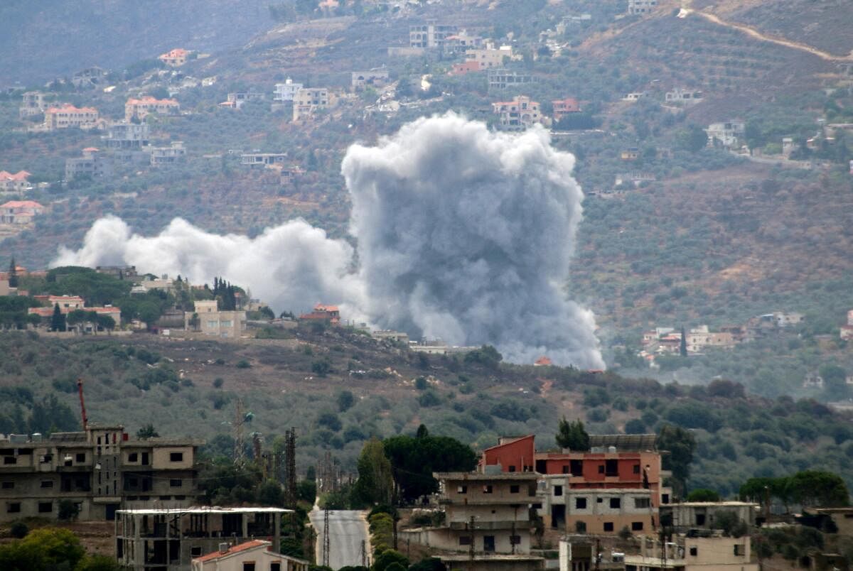 Smoke rises from the southern Lebanese village of Kfar Kila, amid ongoing cross-border hostilities between Hezbollah and Israeli forces, as pictured from Marjayoun, near the border with Israel, September 20, 2024.