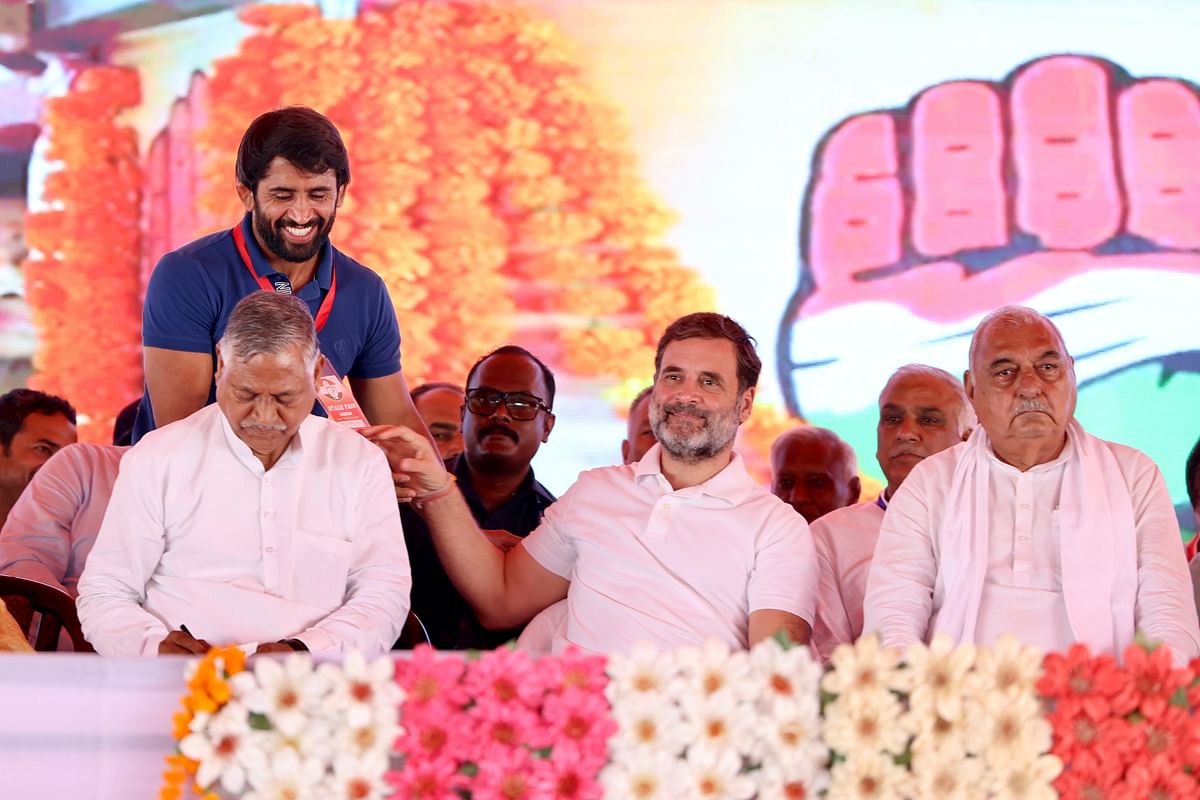 Rahul Gandhi seen here with former Haryana Chief Minister Bhupinder Hooda at the Assandh public meeting.