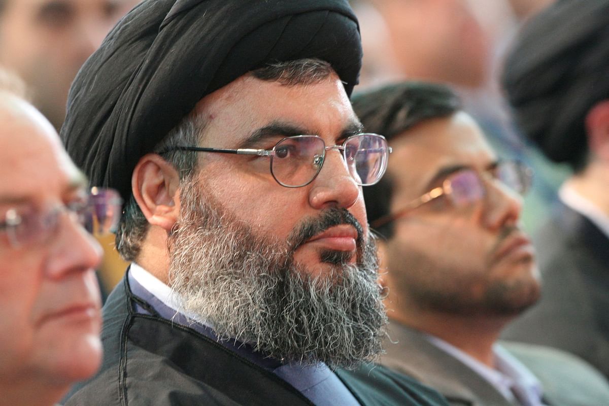 FILE PHOTO: Hezbollah leader Sayyed Hassan Nasrallah attends a graduation ceremony at a university run by the group in a Beirut suburb April 8, 2007. REUTERS/Jamal Saidi/File Photo