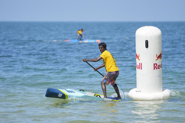 Surfer Sekar Patchai in action during National Stand-Up Paddle Championship, at Rameshwaram, in Ramanathapuram district, Tamil Nadu, Saturday, Sept 28, 2024. 