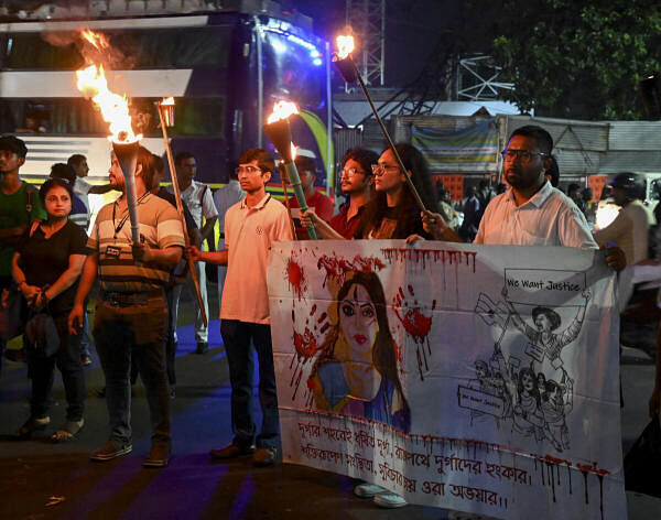 Junior doctors during a torch rally, demanding justice for a trainee doctor, a victim of rape and murder, in Kolkata.