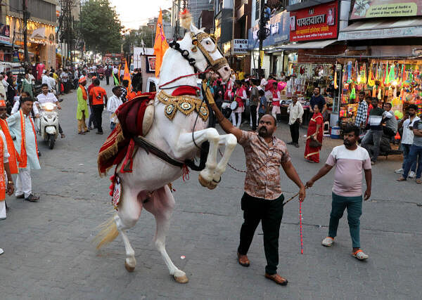 A horse during a procession of 'Maskarya Ganesh Utsav 2024' organised by Maharaja of Nagpur Trust, in Nagpur.