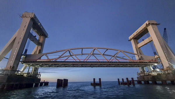 The test lifting of the vertical lift of new Pamban rail bridge being conducted successfully, at Rameswaram in Ramanathapuram district of Tamil Nadu. 