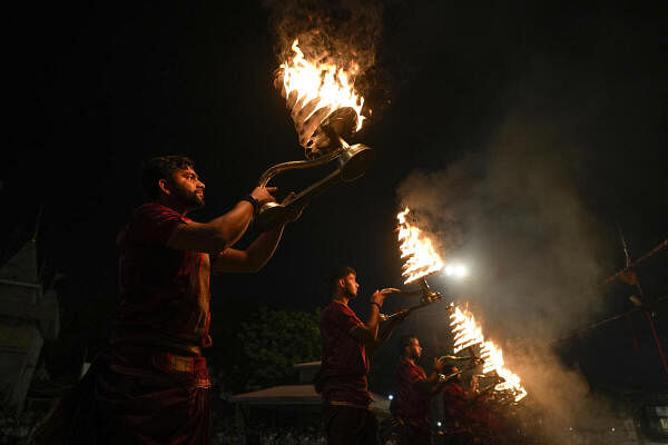 Priests perform 'Ganga Aarti', at Assi Ghat in Varanasi, UP.