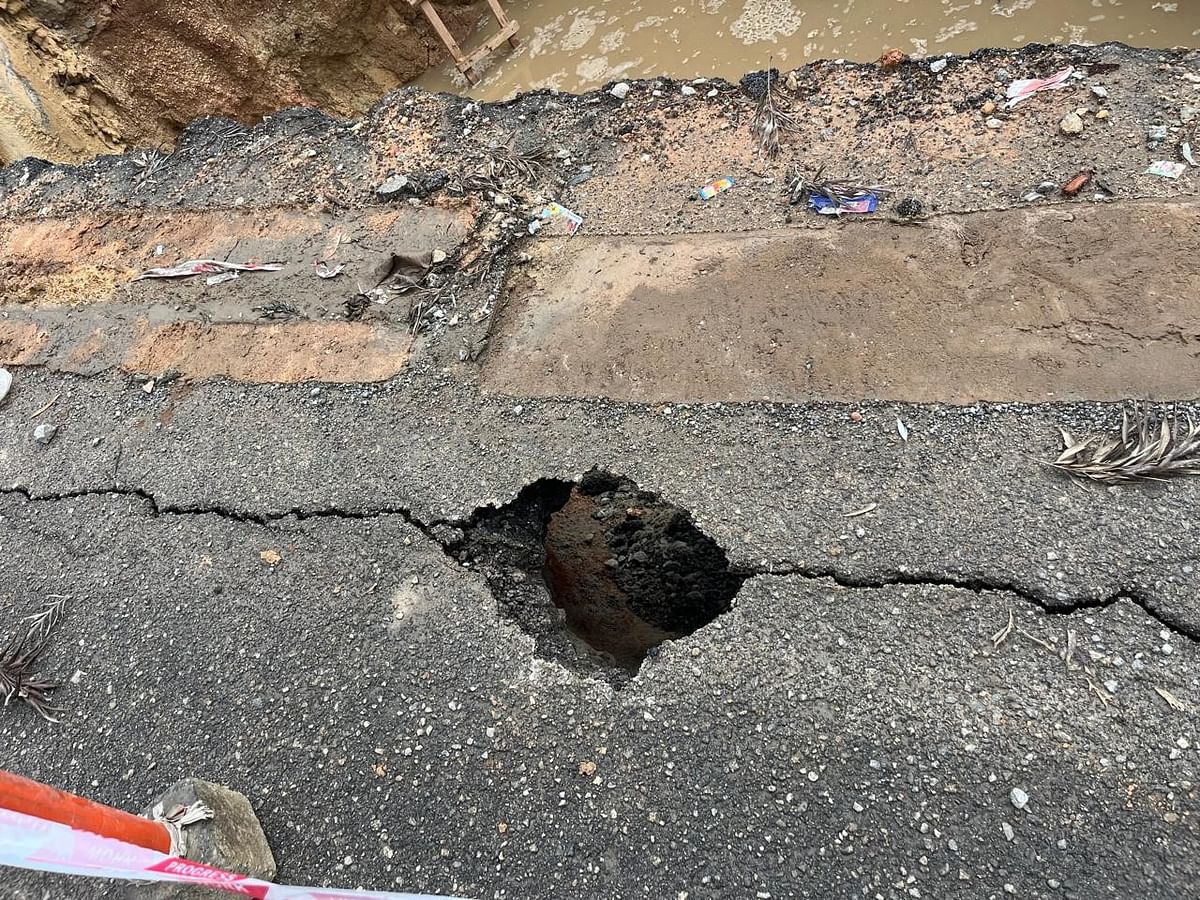 The portion of the road that caved in on the ORR service road on Thursday.   