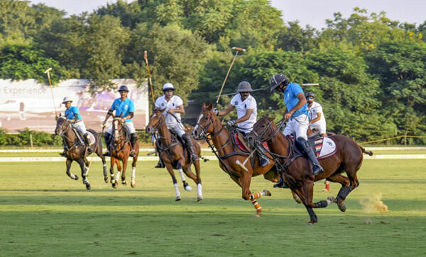 Mayo White and Mayo Blue players in action during the Annual Mayo Polo Cup 2024 match, in Jaipur.