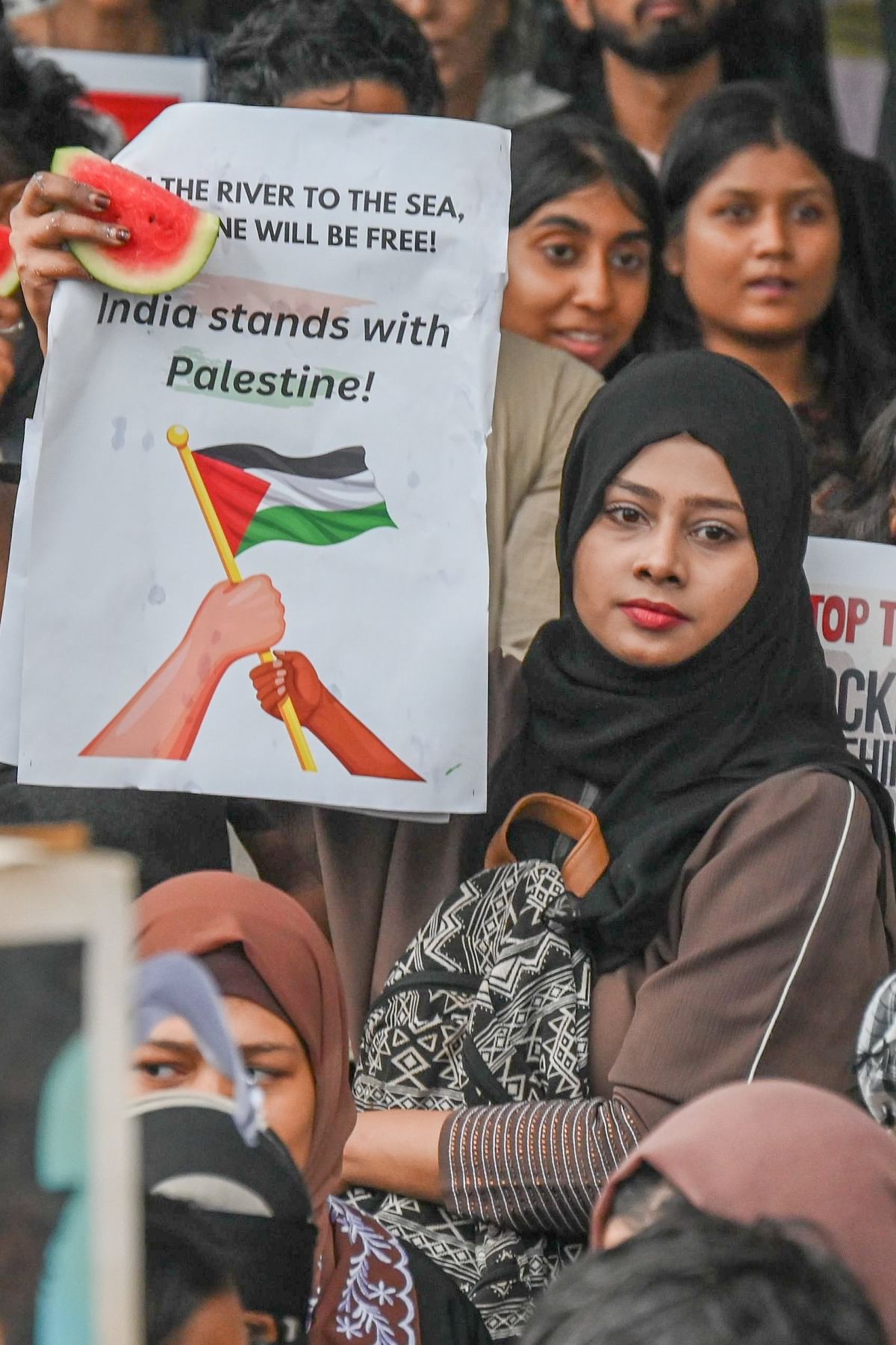 Supporters of Palestine initiate a protest at Freedom Park in Bengaluru.