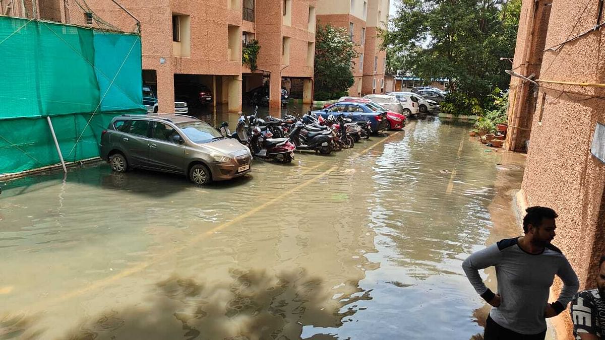 A compound wall collapsed at Binnypet, damaging some bikes parked along the wall.