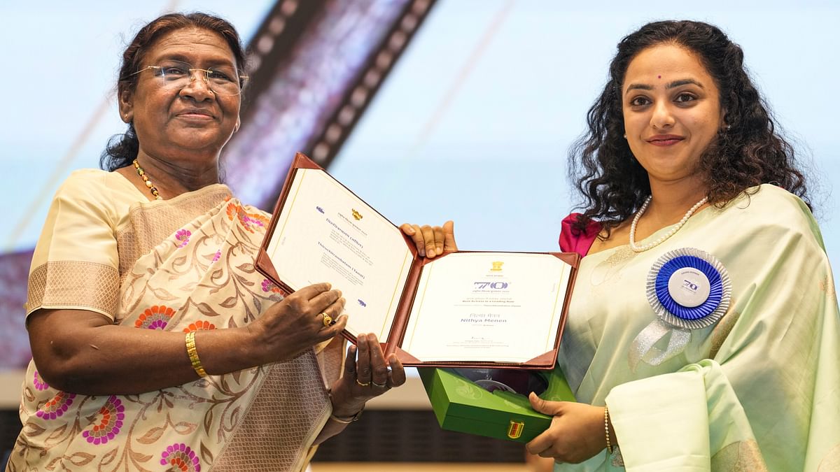 President Droupadi Murmu presents the 'Best Actress in a Leading Role’ award for ‘Thiruchitrambalam (Tamil)' to Nithya Menen during the 70th National Film Awards, at Vigyan Bhawan, in New Delhi.