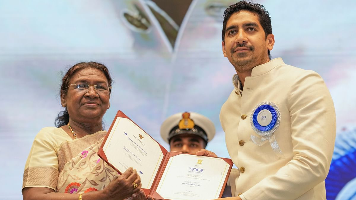 President Droupadi Murmu presents 'Best Film in AVGC’ award for ‘Brahmastra Part 1-Shiva' to director Ayan Mukerji during the 70th National Film Awards, at Vigyan Bhawan, in New Delhi.