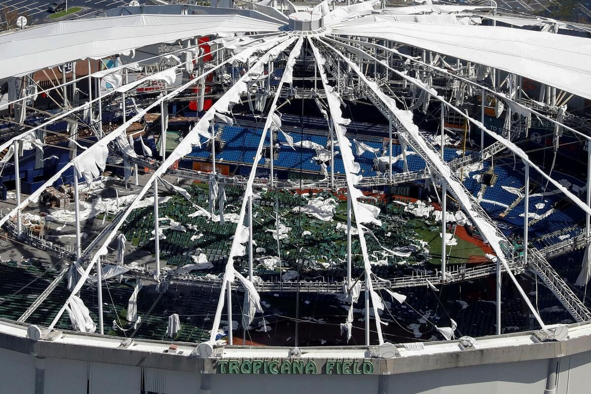 An aerial view shows the damaged Tropicana Field, home of the Tampa Bay Rays, in the aftermath of Hurricane Milton, in St Petersburg, Florida US.