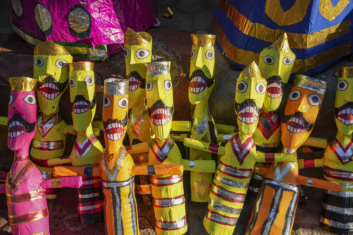 Effigies of demon King Ravana on display for sale on the eve of Dussehra festival, in west Delhi’s Titarpur.