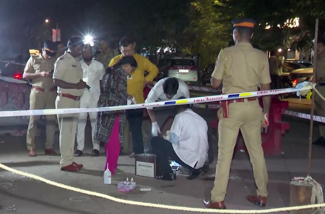 A forensic team investigates the site where former Maharashtra minister Baba Siddique was shot dead by three assailants, in Mumbai, Saturday night, Oct 12, 2024.