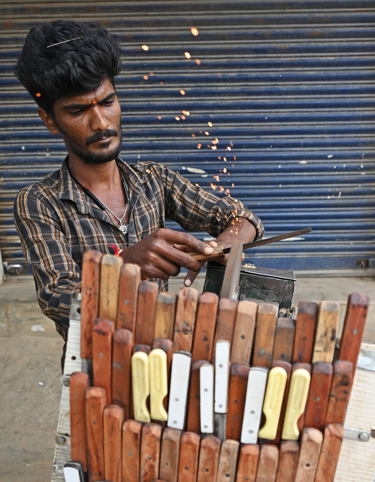 For DH Spectrum: A mobile knife sharpener in Rajarajeshwari Nagar Benglauru. 