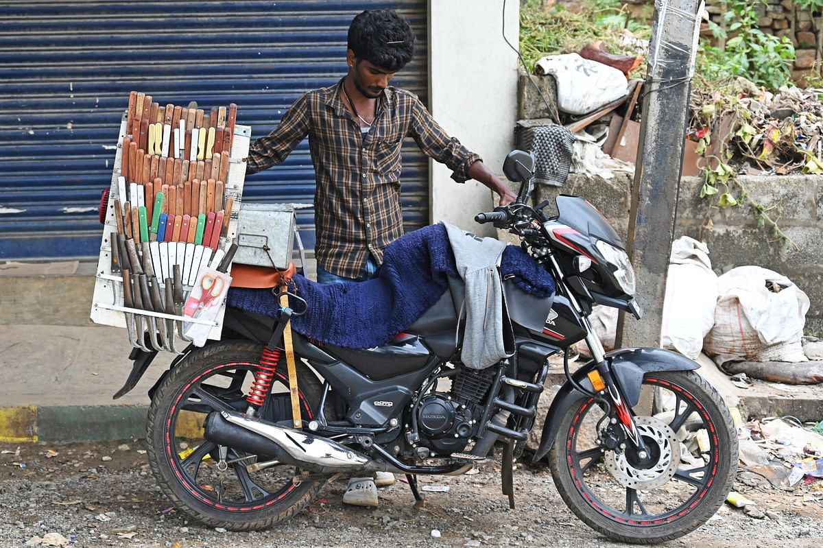 For DH Spectrum: A mobile knife sharpener in Rajarajeshwari Nagar Benglauru. 