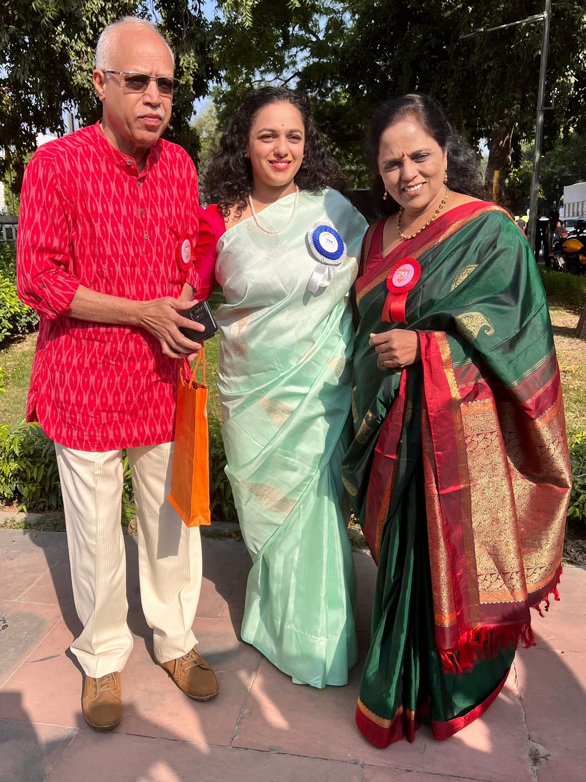 Nithya Menen poses with her parents as they arrive for the 70th National Film Awards at Vigyan Bhawan in New Delhi.