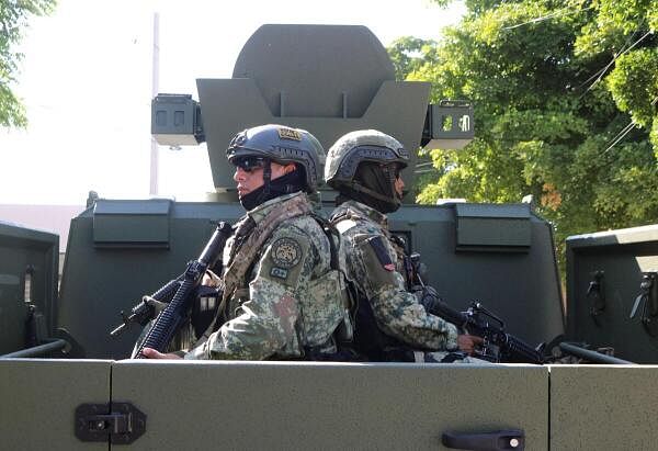 Soldiers patrol a neighbourhood after Mexico's military deployed additional troops to the violence-stricken state of Sinaloa over the weekend, in Culiacan, Mexico.