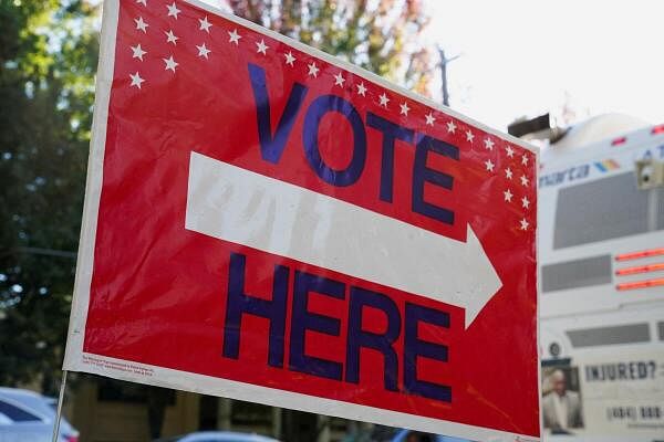 Georgians turned out a day after the battleground state opened early voting.