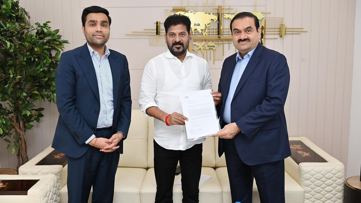 Gautam Adani meets Telangana CM Revanth Reddy, hands over Rs 100 crore cheque for skills varsity