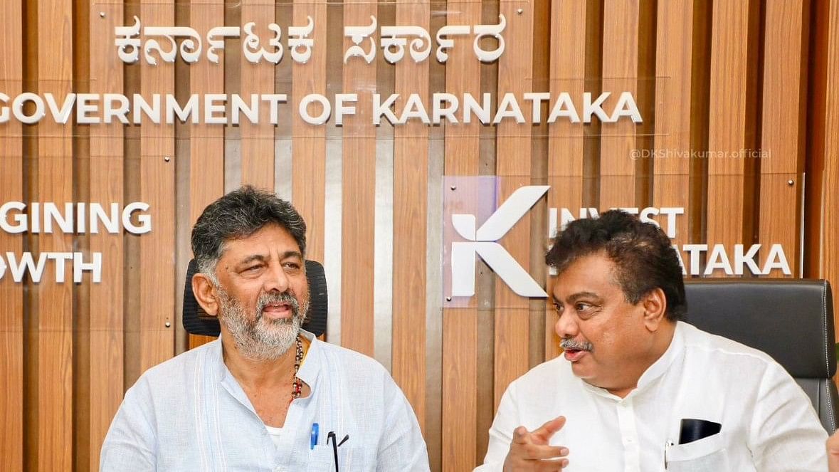 Deputy Chief Minister DK Shivakumar and Minister for Large and Medium Industries MB Patil during the meeting at Vidhana Soudha in Bengaluru on Friday. DH PHOTO