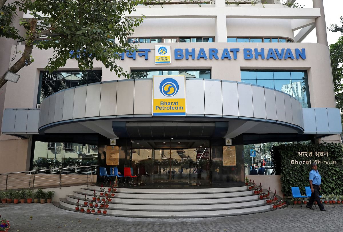 FILE PHOTO: A private security guard stands in front of the regional head office of oil refiner Bharat Petroleum Corp (BPCL) in Kolkata.