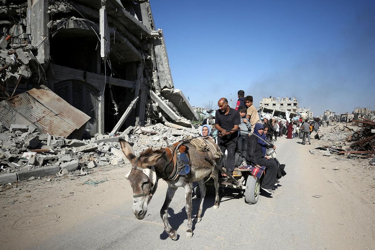 Displaced Palestinians flee the northern part of Gaza amid an Israeli military operation, in Jabalia in the northern Gaza Strip.