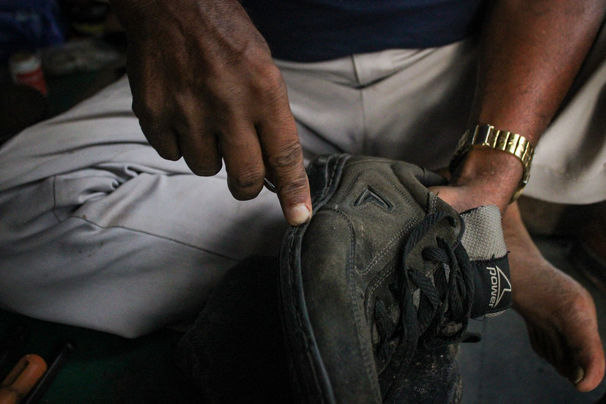 A cobbler at work in Bengaluru. Photos by author