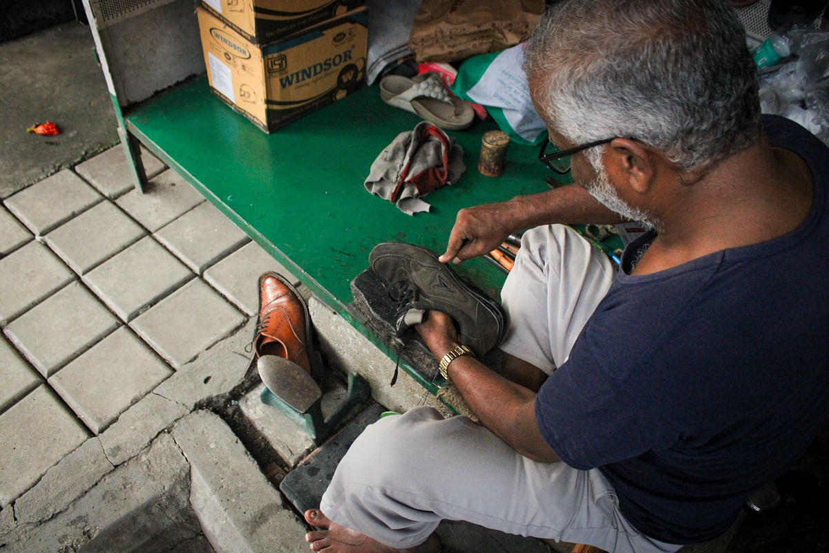 A cobbler at work in Bengaluru. Photos by author