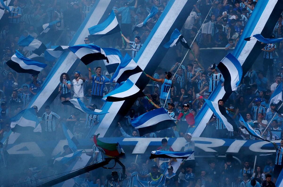 Brasileiro Championship - Gremio v Atletico Goianiense - Arena do Gremio, Porto Alegre, Brazil - October 26, 2024 Gremio fans with flares inside the stadium before the match.