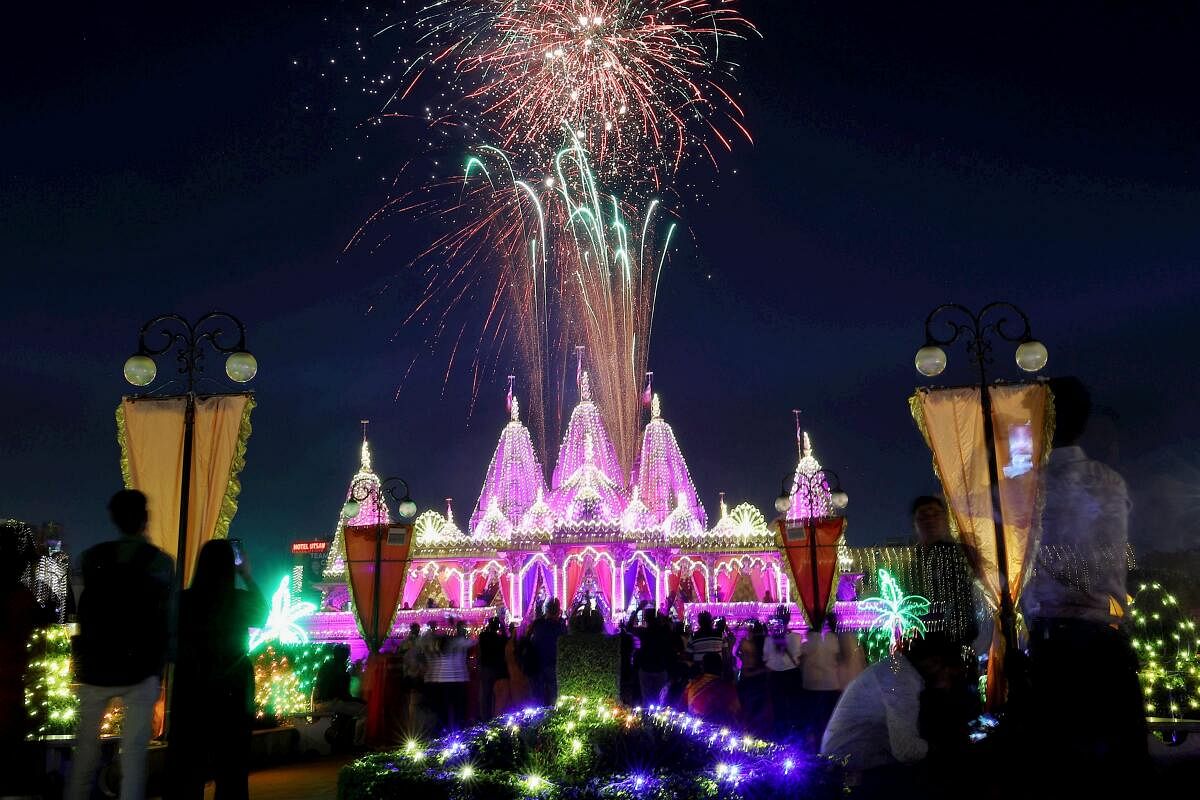 Fireworks light the sky at the illuminated Akshardham temple on the occasion of the Diwali Festival, in Jaipur, Thursday, Oct 31, 2024.