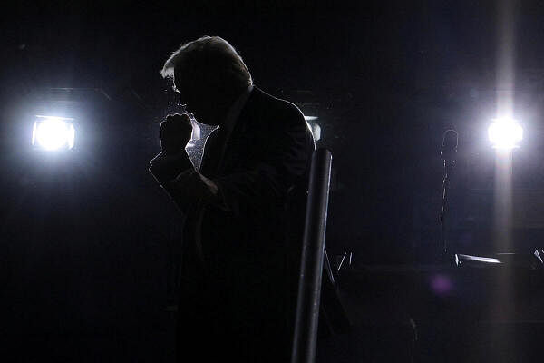 Republican presidential nominee and former US President Donald Trump gestures onstage during a campaign rally, in Salem, Virginia, US.