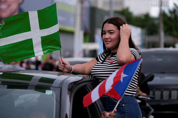 Supporters of the Pro-Independence Party and Movimiento Victoria Ciudadana congregate to chant and celebrate in front of the San Juan headquarters of the Pro-Independence Party during the U.S. general elections in San Juan, Puerto Rico, November 5, 2024.