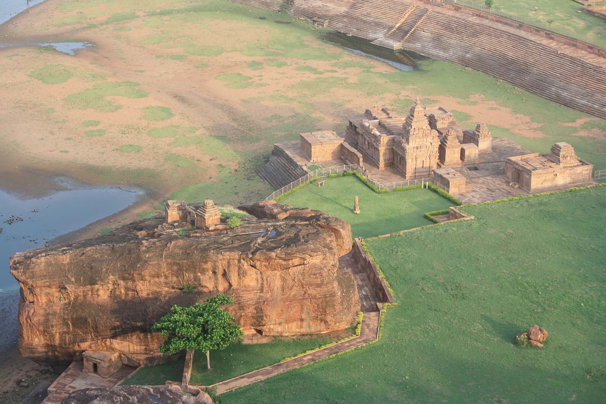 An aerial view of the Panchalinganaphadi boulder with the Bhutanatha temples in the background