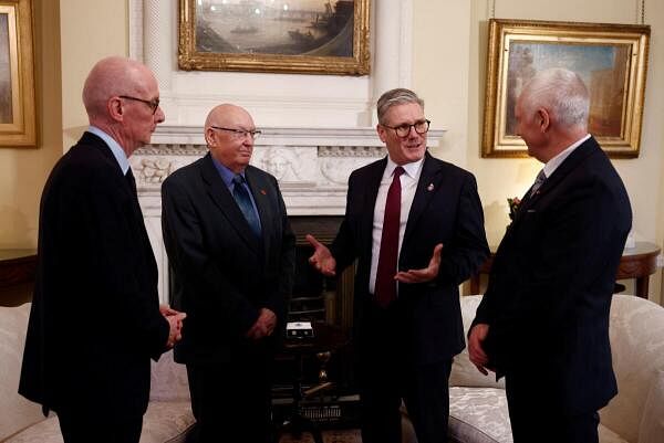 Britain's PM Starmer meets fathers of Police Officers who were murdered in the line of duty, at 10 Downing Street