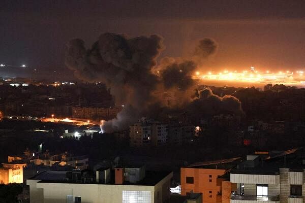 Smoke billows over Beirut's southern suburbs, after an Israeli strike, amid the ongoing hostilities between Hezbollah and Israeli forces, as seen from Baabda, Lebanon