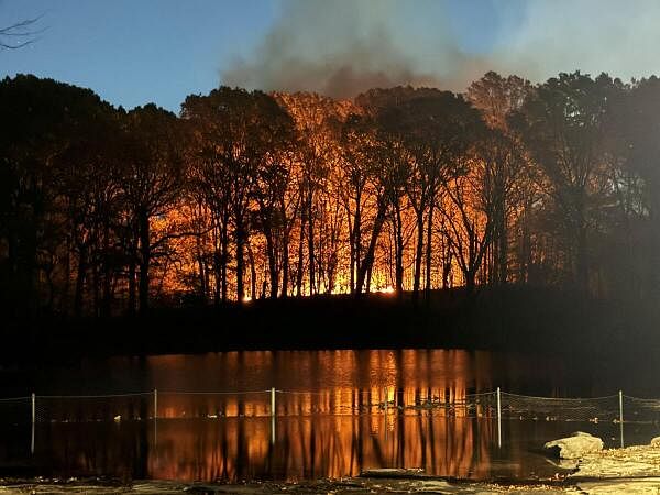 Smoke billows from a fire at Prospect Park, New York City, New York, US.