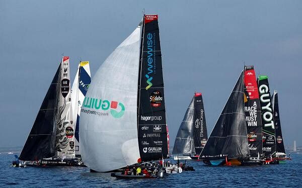 France's Fabrice Amedeo and sailors in action during the race.