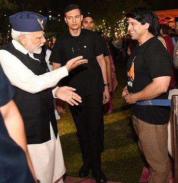 PM Modi with BJP's Shehzad Poonawalla