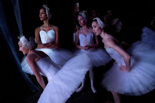 Ballet dancers prepare to perform Swan Lake during the 28th Alicia Alonso International Ballet Festival of Havana at the National Theatre in Havana, Cuba.