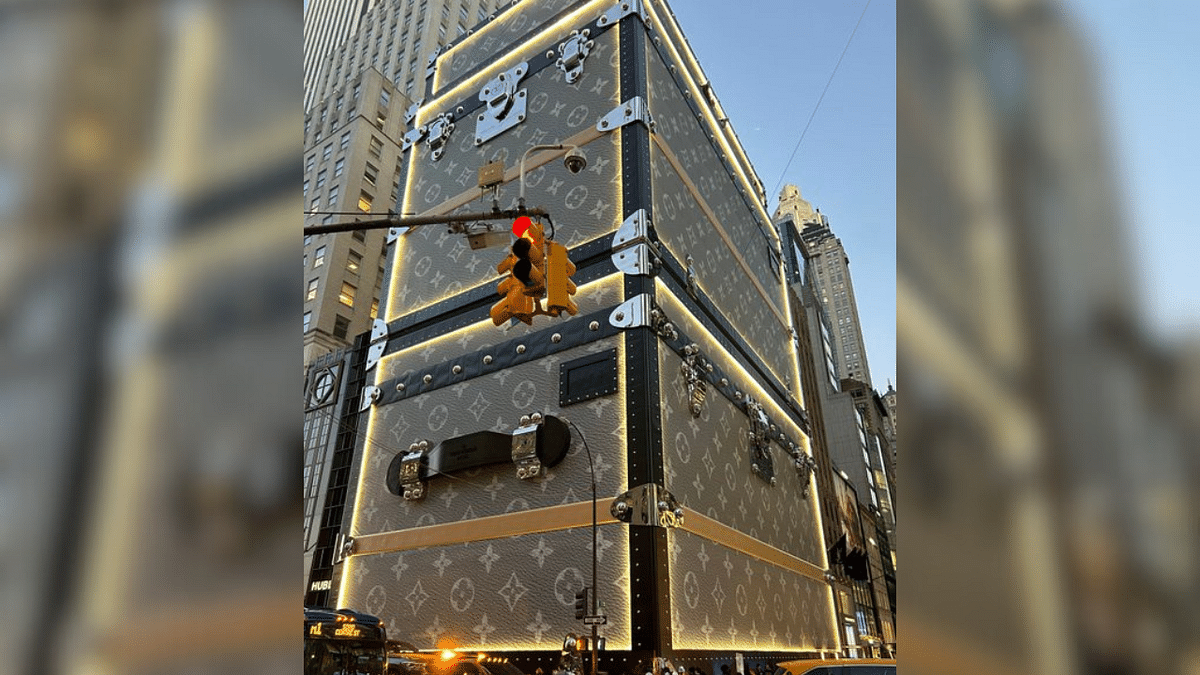 Louis Vuitton's flagship store renovation disguised as stack of luggage trunks.