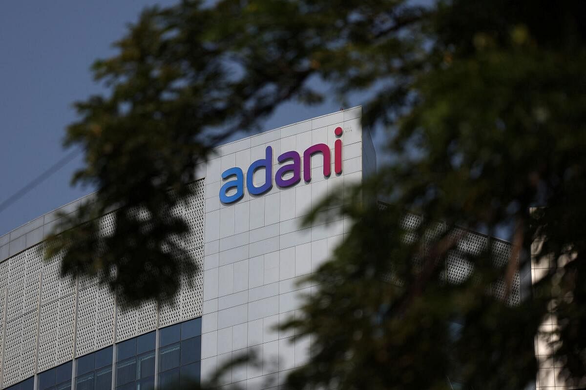 The logo of the Adani Group is seen on the facade of its Corporate House on the outskirts of Ahmedabad.