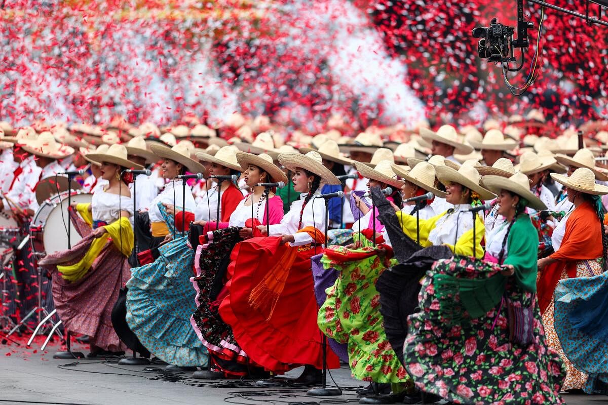 Participants in historical costumes attend the celebrations to mark the 114th anniversary of the Mexican Revolution, in Mexico City, Mexico November 20, 2024.