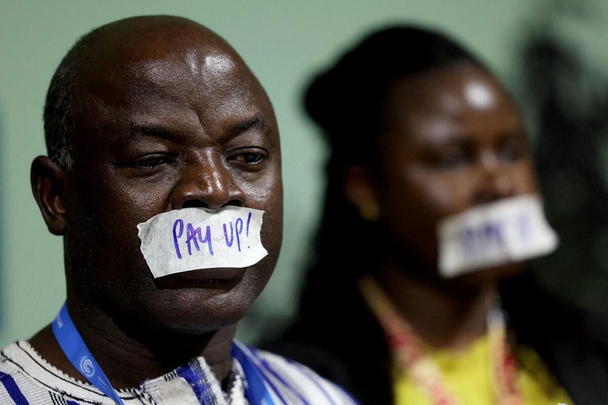 Activists take part in a protest calling on developed nations to provide financing to fight climate change, during the COP29 United Nations Climate Change Conference, in Baku, Azerbaijan November 22, 2024.