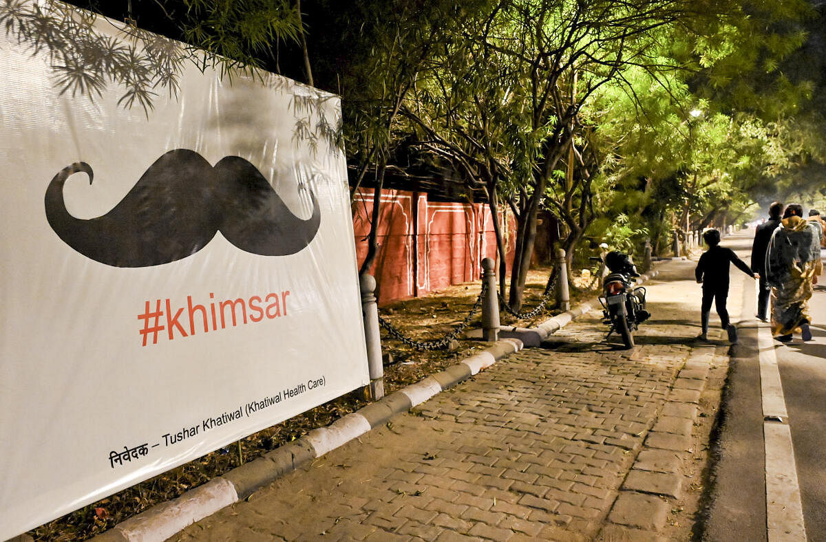 Mustache hoarding placed outside the residence of Rajasthan minister Gajendra Singh Khimsar after BJP won 5 seats in bypolls election, at Civil lines in Jaipur.