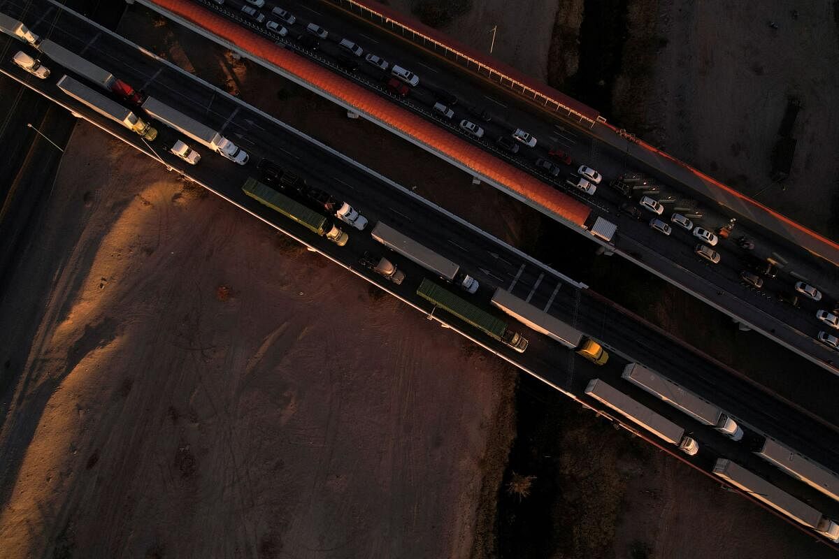 A drone view shows trucks waiting in line at the Zaragoza-Ysleta border crossing bridge to cross into the US, in Ciudad Juarez, Mexico.