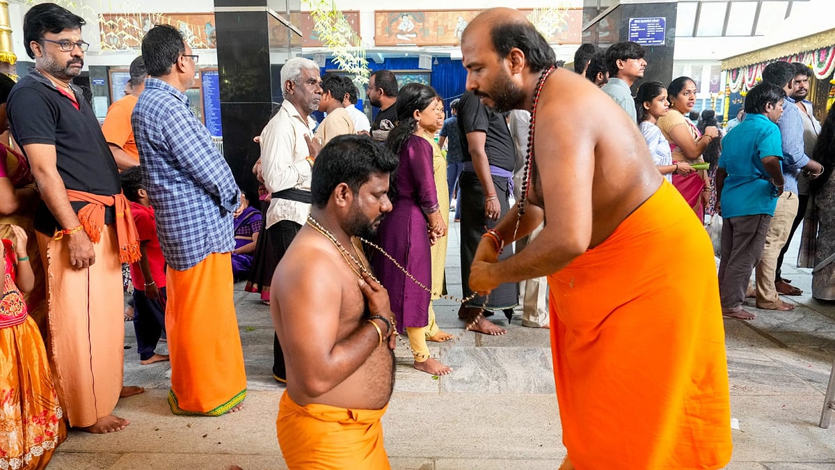 Kerala monk wants temple shirt rule changed.