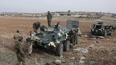 Syria rebels celebrate in captured Homs, set sights on Damascus