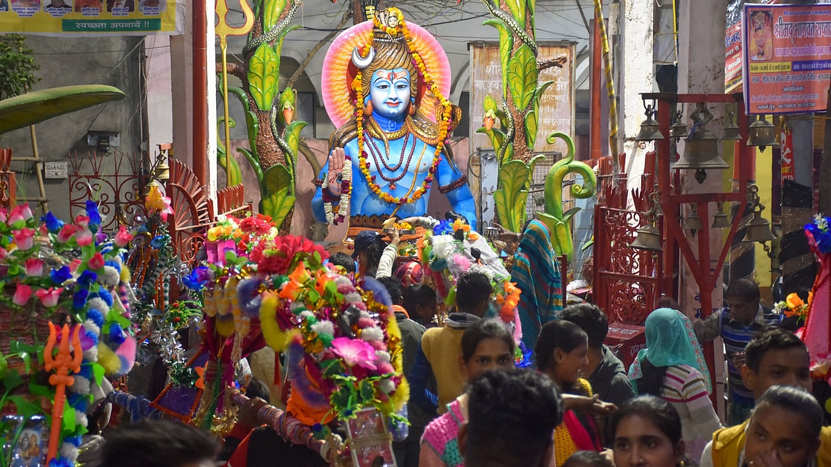 Devotees visit a Shiv temple on the occasion of Maha Shivratri in Moradabad.