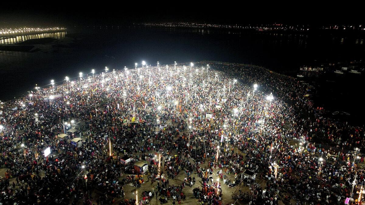 A drone shot showing devotees gathered to take a holy dip at the Sangam on the occasion of Maha Shivratri festival during the ongoing Maha Kumbh Mela 2025, in Prayagraj